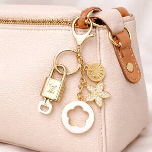 Authentic Louis Vuitton Gold Padlock & Key with Unbranded Flower Keychain